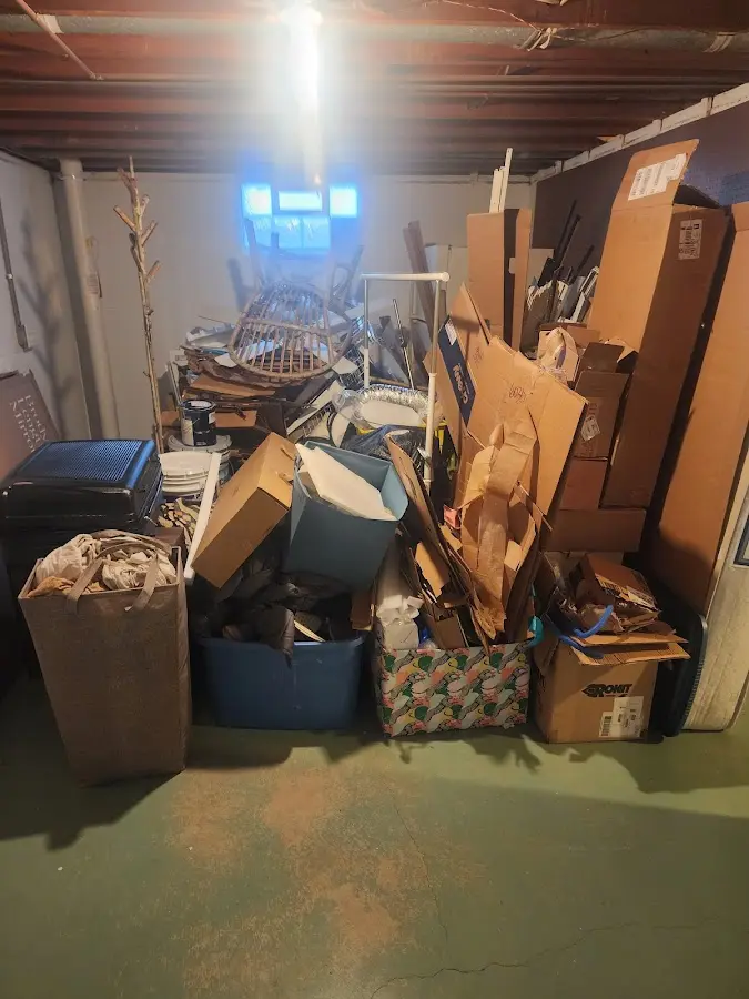 Roll-off dumpster container at job site for 2 Yard Dumpster Rental in Bulverde